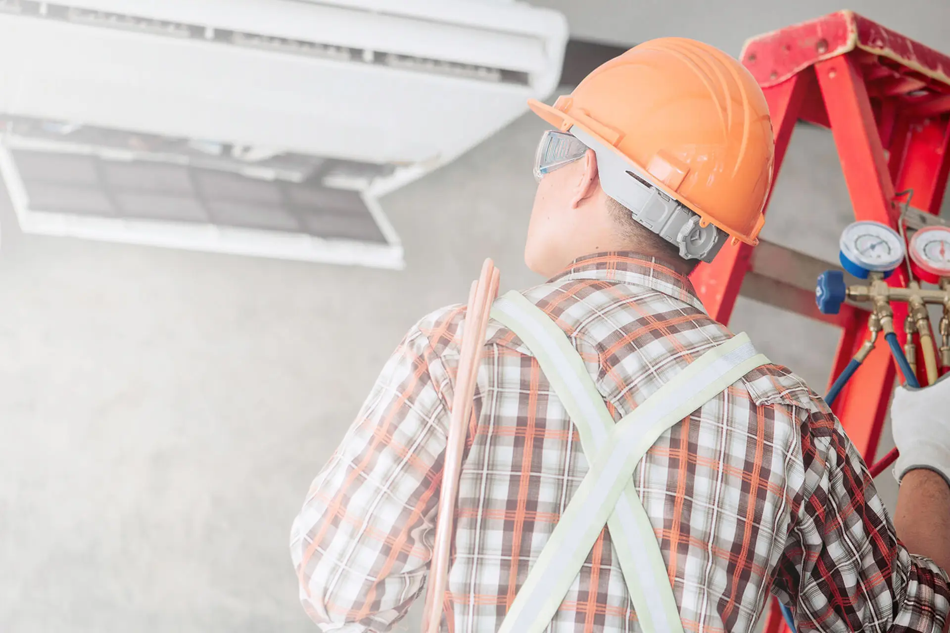 Professional HVAC technician servicing a heating system.